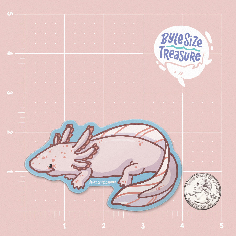 A leucistic pink axolotl sticker - shown on a pink measuring grid background with a quarter for scale. Art by Byte Size Treasure